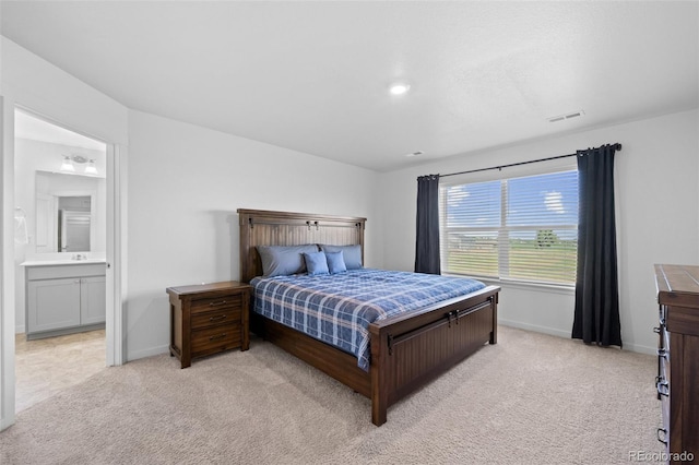 437 Thrush Pl, Johnstown, CO 80534 - bedroom featuring light carpet and connected bathroom