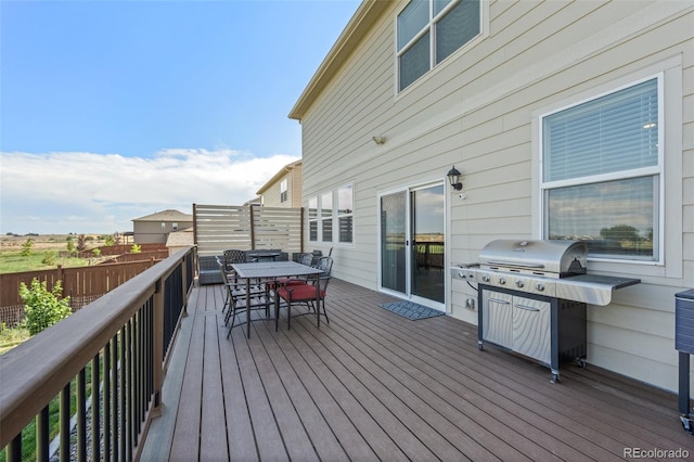 437 Thrush Pl, Johnstown, CO 80534 - deck featuring outdoor dining area and area for grilling