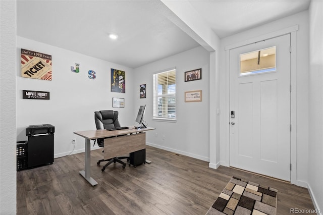 437 Thrush Pl, Johnstown, CO 80534 - office space featuring dark wood-style flooring and baseboards