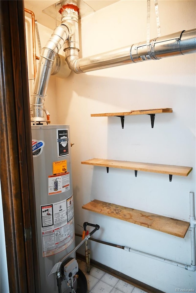 utility room with gas water heater