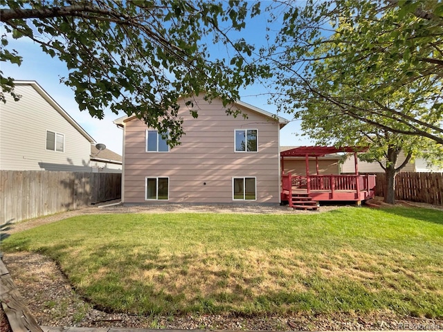 4011 W 28th Street Rd, Greeley, CO 80634 - back of property with a fenced backyard and a wooden deck