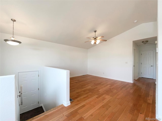 4011 W 28th Street Rd, Greeley, CO 80634 - empty room featuring vaulted ceiling, a ceiling fan, and light wood-style floors