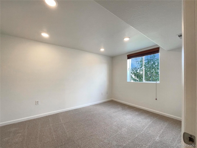 4011 W 28th Street Rd, Greeley, CO 80634 - spare room featuring carpet floors and recessed lighting
