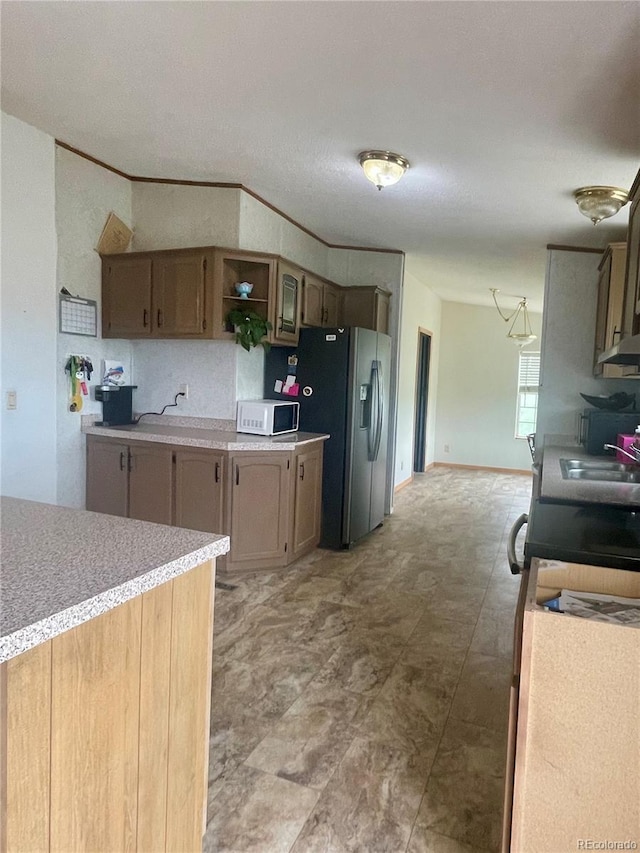 47904 Dartmouth Ave, Bennett, CO 80102 - kitchen featuring stainless steel fridge with ice dispenser, white microwave, a sink, open shelves, and light countertops