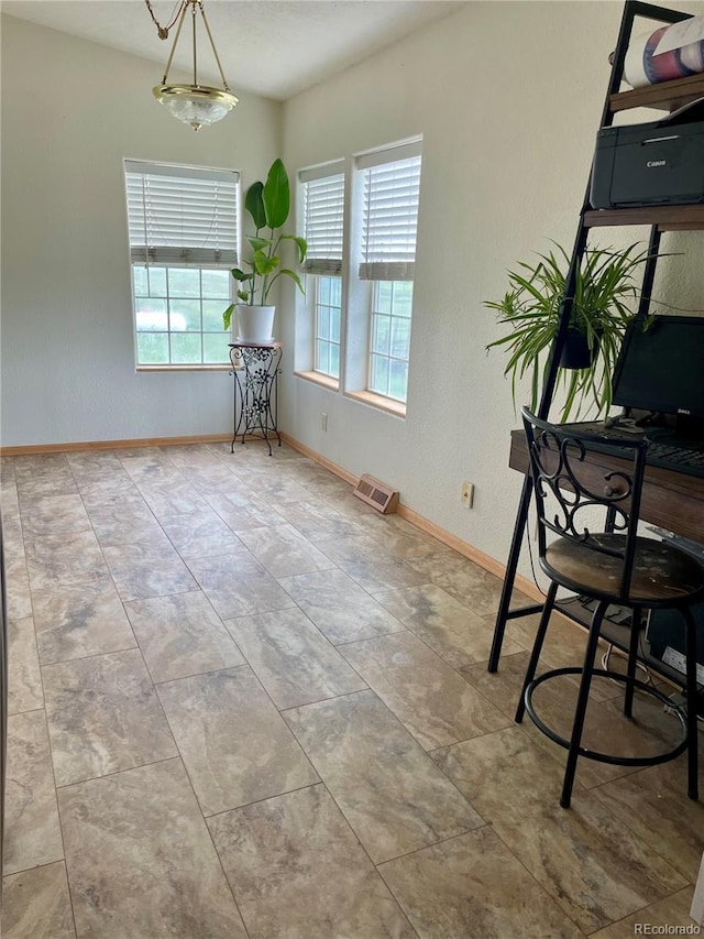 47904 Dartmouth Ave, Bennett, CO 80102 - dining room with baseboards and a chandelier