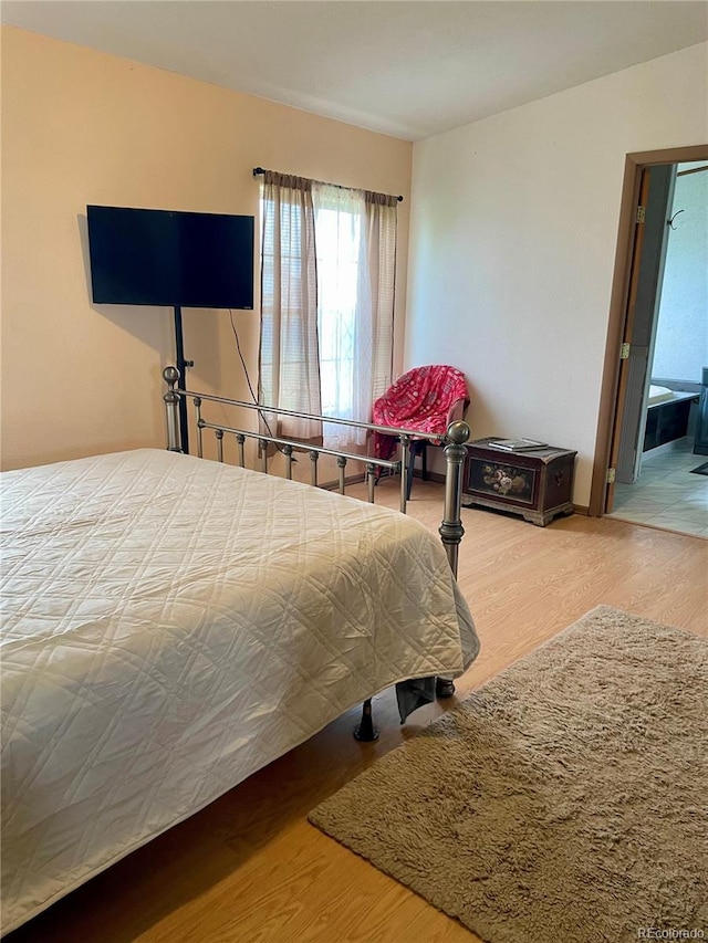 47904 Dartmouth Ave, Bennett, CO 80102 - bedroom with wood finished floors
