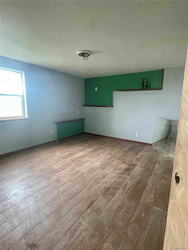 47904 Dartmouth Ave, Bennett, CO 80102 - empty room featuring hardwood / wood-style flooring