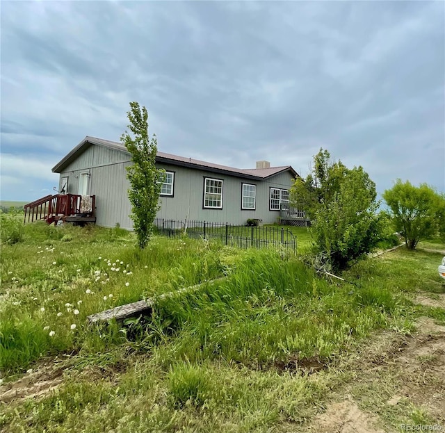 47904 Dartmouth Ave, Bennett, CO 80102 - back of house featuring a wooden deck
