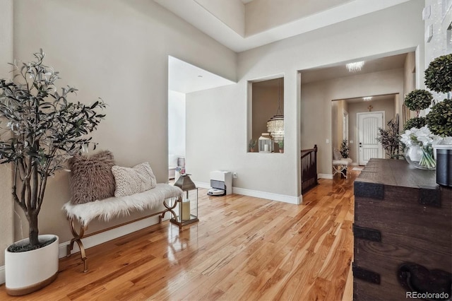 sitting room featuring light wood-style floors and baseboards