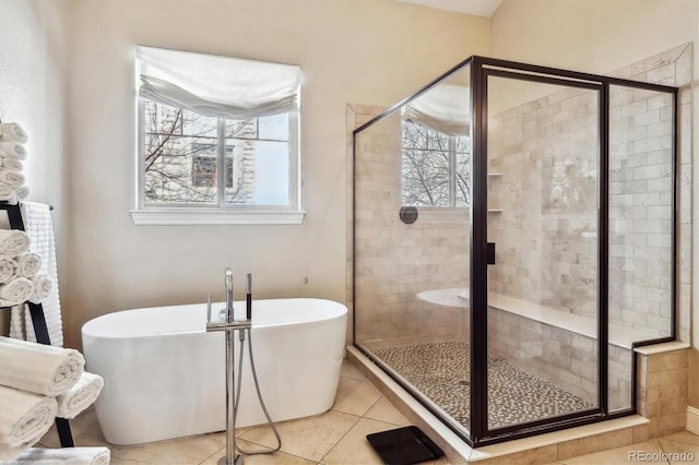 6875 Northstar Ct, Castle Rock, CO 80108 - bathroom with a freestanding bath, plenty of natural light, a shower stall, and tile patterned flooring
