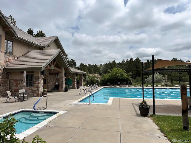 6875 Northstar Ct, Castle Rock, CO 80108 - community pool featuring a patio area