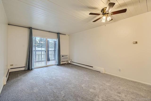 carpeted empty room featuring ceiling fan, baseboard heating, and wood ceiling