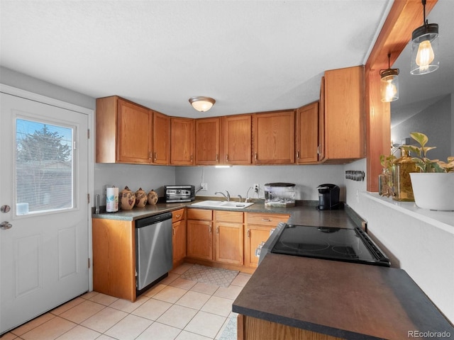 kitchen featuring light tile patterned floors, range with electric cooktop, a sink, dishwasher, and dark countertops