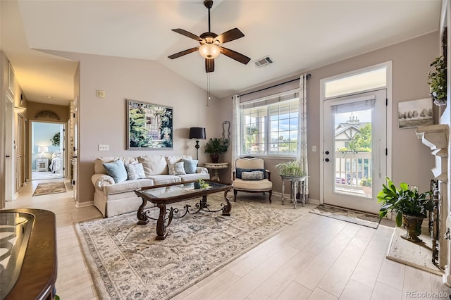 10467 W Hampden Ave Unit 204, Lakewood, CO 80227 - living area featuring a ceiling fan, light wood-type flooring, and lofted ceiling