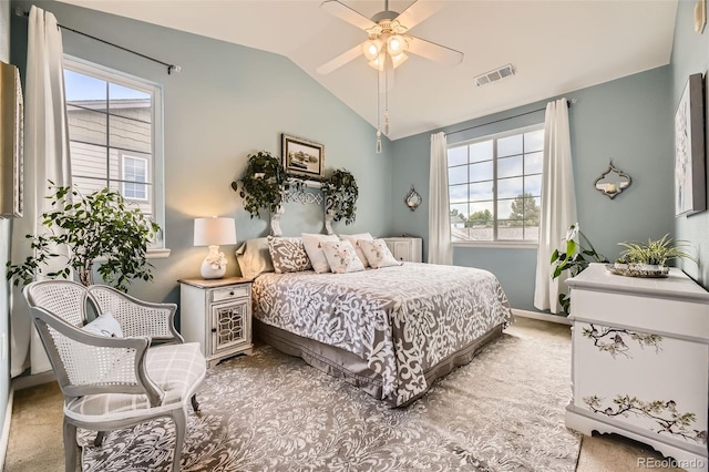 10467 W Hampden Ave Unit 204, Lakewood, CO 80227 - bedroom with light colored carpet, vaulted ceiling, and ceiling fan