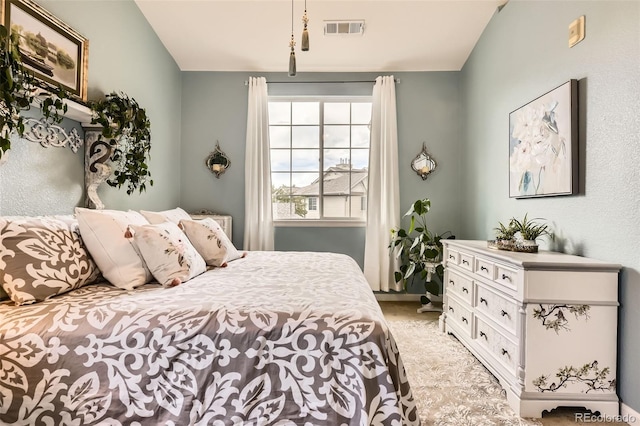 10467 W Hampden Ave Unit 204, Lakewood, CO 80227 - bedroom with vaulted ceiling and light carpet