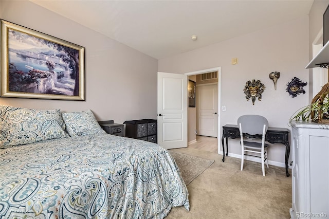 10467 W Hampden Ave Unit 204, Lakewood, CO 80227 - bedroom featuring light carpet and baseboards