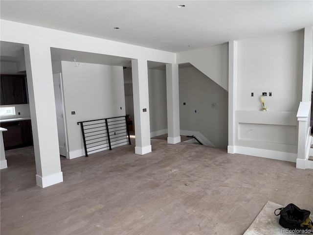 basement featuring light wood-type flooring