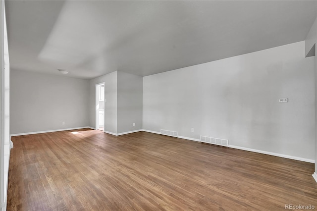 426 Kenton St, Aurora, CO 80010 - unfurnished room with wood finished floors and baseboards