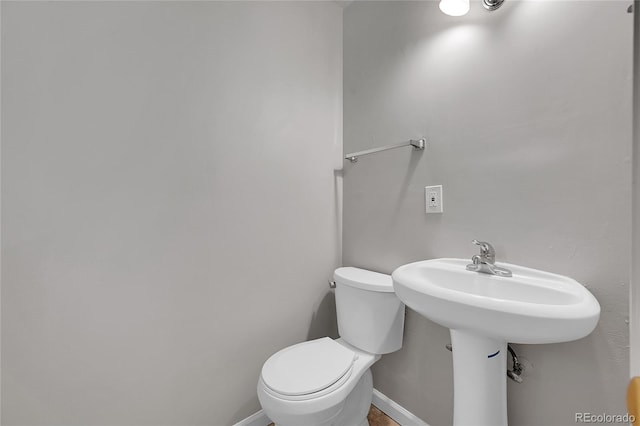 426 Kenton St, Aurora, CO 80010 - half bath with toilet and baseboards