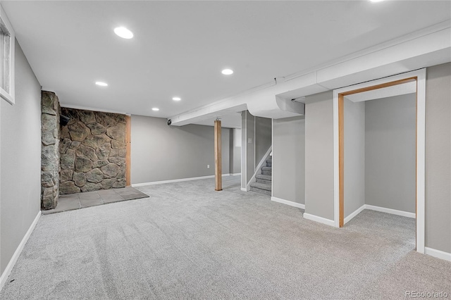 426 Kenton St, Aurora, CO 80010 - finished below grade area featuring carpet flooring, recessed lighting, and stairs