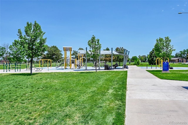 426 Kenton St, Aurora, CO 80010 - view of community with a lawn