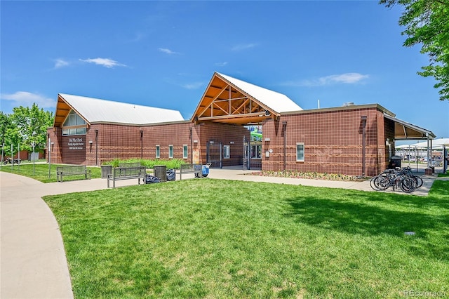 426 Kenton St, Aurora, CO 80010 - view of community with a yard