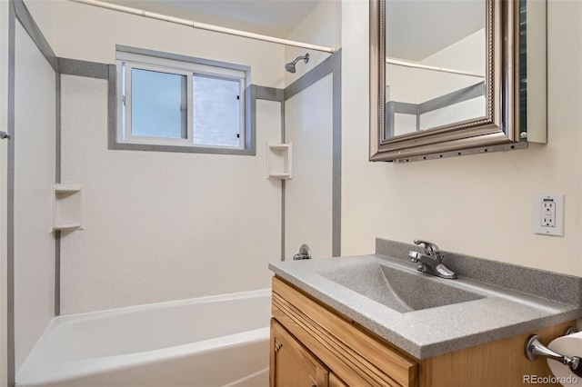 bathroom with vanity and shower / washtub combination