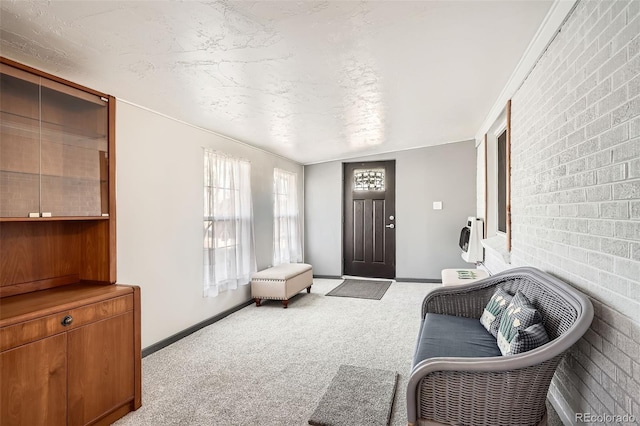 interior space featuring heating unit and a textured ceiling