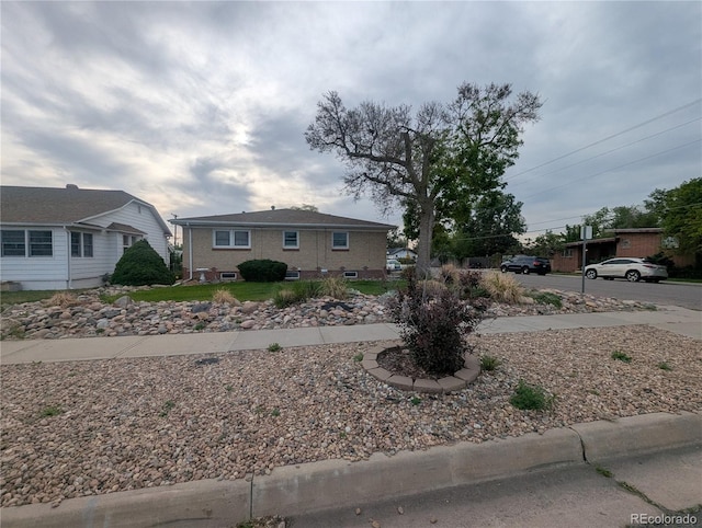 1009 Bush St, Brighton, CO 80601 - view of front of house with brick siding