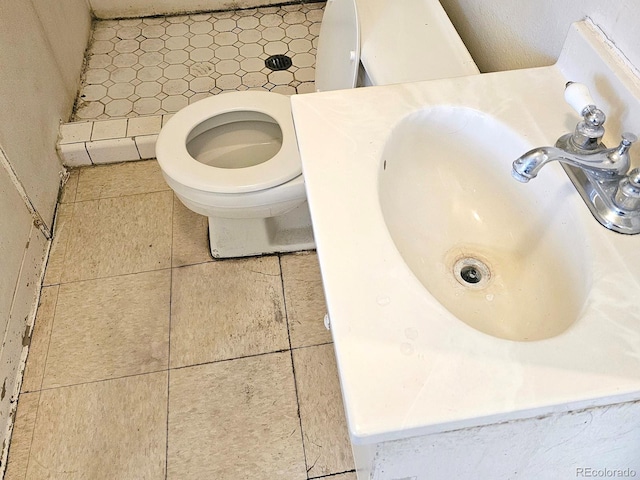 details with toilet and a sink