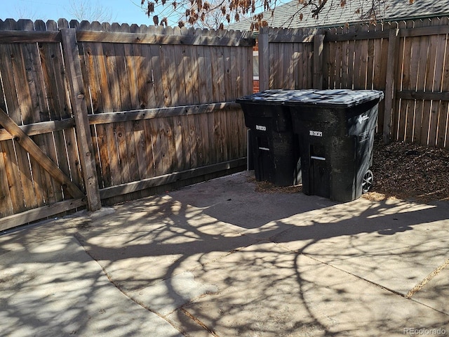 view of patio / terrace featuring fence