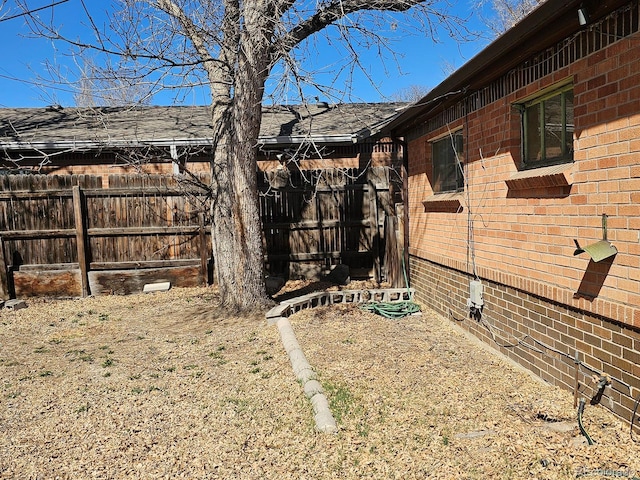 view of yard featuring fence