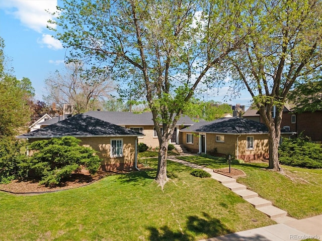 236 S Clarkson St, Denver, CO 80209 - ranch-style home with a front lawn, brick siding, and roof with shingles
