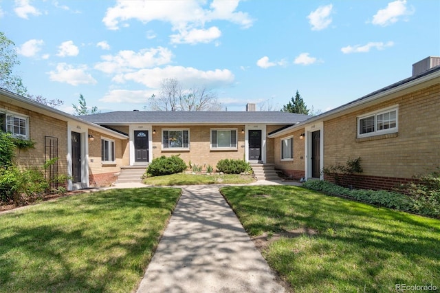 236 S Clarkson St, Denver, CO 80209 - single story home with brick siding and a front lawn
