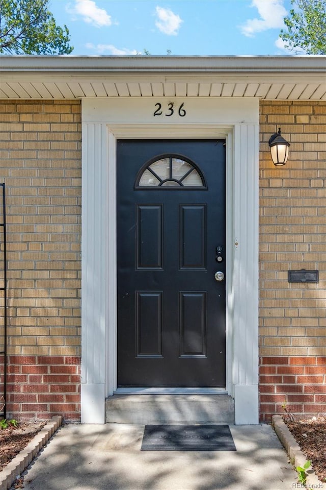 236 S Clarkson St, Denver, CO 80209 - property entrance featuring brick siding