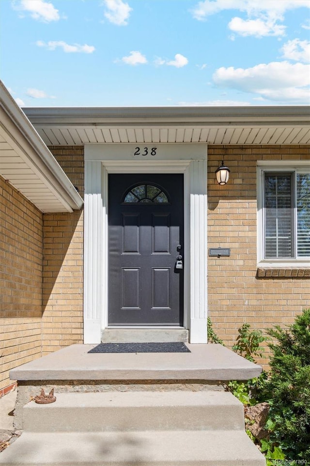 236 S Clarkson St, Denver, CO 80209 - property entrance featuring brick siding