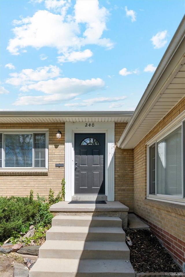 236 S Clarkson St, Denver, CO 80209 - view of exterior entry featuring brick siding