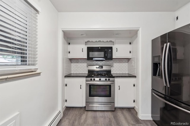 236 S Clarkson St, Denver, CO 80209 - kitchen with fridge with ice dispenser, gas range, black microwave, dark countertops, and wood finished floors