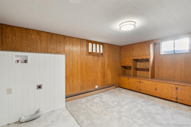 236 S Clarkson St, Denver, CO 80209 - basement featuring wooden walls and a baseboard radiator