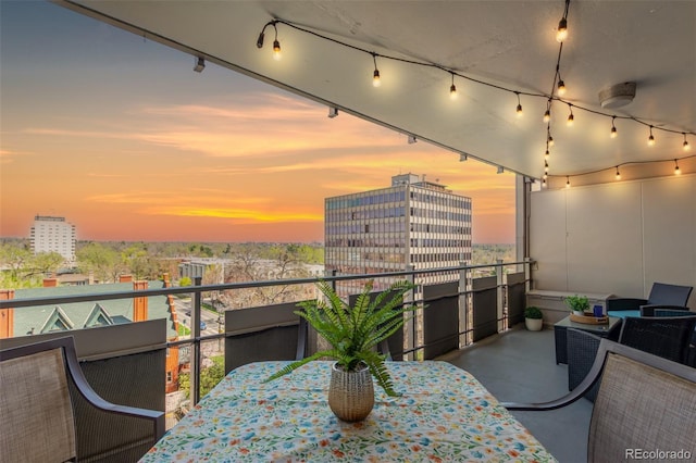 800 N Washington St Unit 804, Denver, CO 80203 - balcony with outdoor dining area and a city view