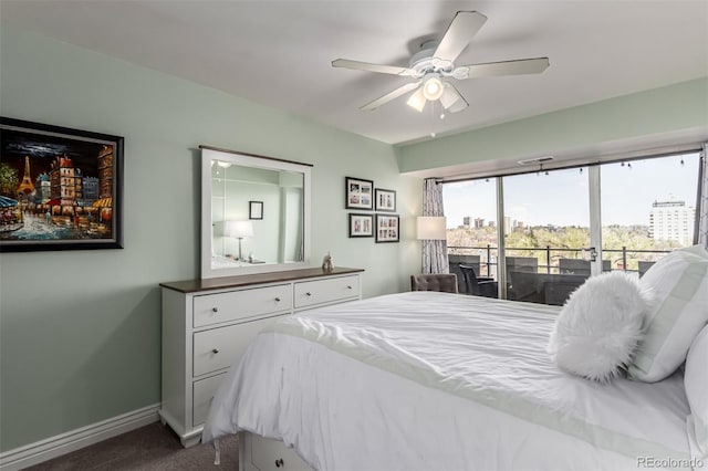 800 N Washington St Unit 804, Denver, CO 80203 - bedroom with access to outside, dark colored carpet, baseboards, ceiling fan, and a view of city