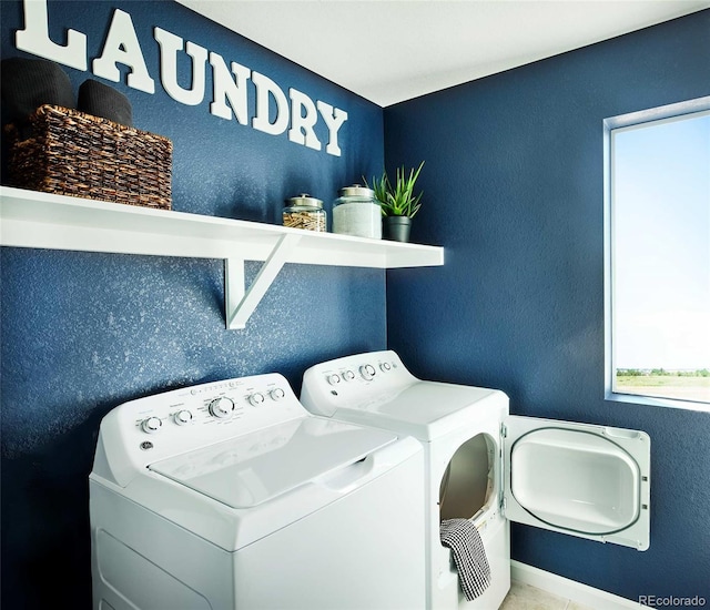 laundry area featuring separate washer and dryer