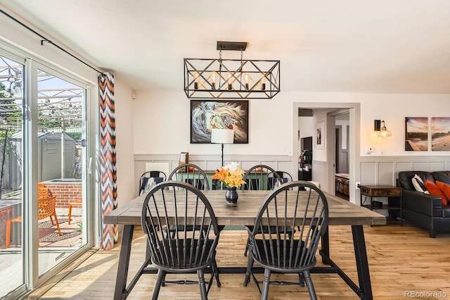 1271 Uinta St, Denver, CO 80220 - dining space featuring light wood-style flooring and wainscoting