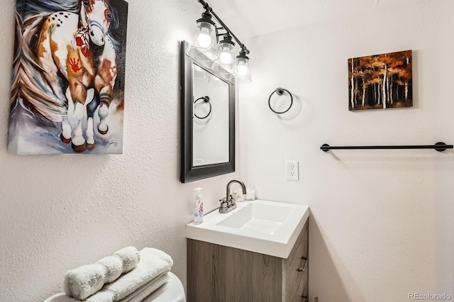 1271 Uinta St, Denver, CO 80220 - bathroom featuring vanity and toilet