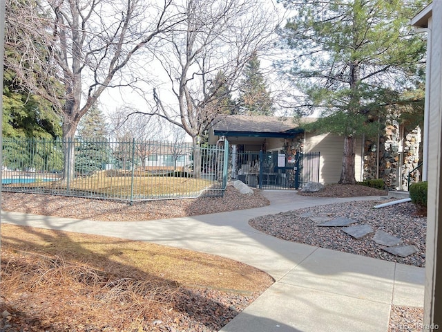 surrounding community featuring a fenced front yard