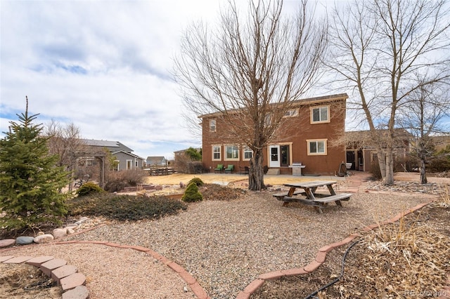 rear view of property with a patio