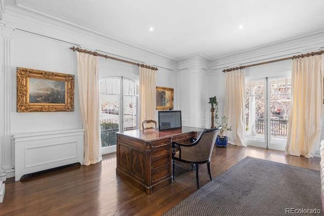 office with ornamental molding and dark wood-type flooring