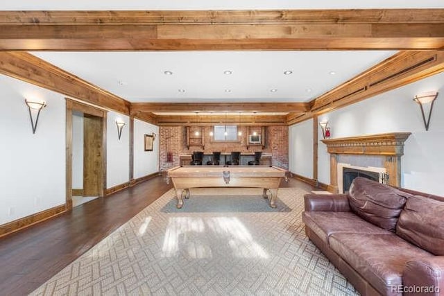 playroom with hardwood / wood-style floors, beam ceiling, and billiards