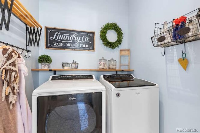 clothes washing area featuring washing machine and dryer